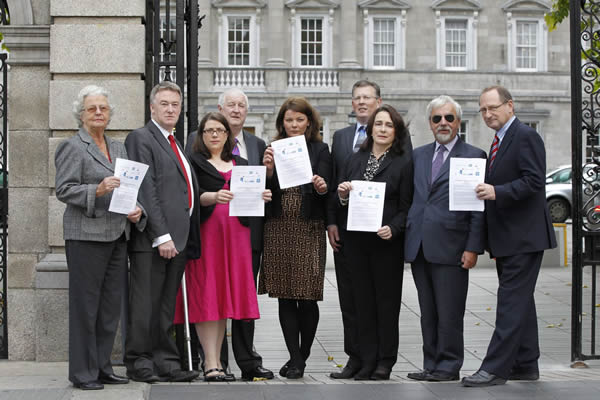 Dublin Thursday 15th September 2011: Judy Windell (left) with John Dolan, Denise Dunne, Tom King, Natalie Buhl, Morgan McKnight, Deirdre Carroll, Des Kenny and Maurice O'Carroll, members of ten national organisations representing 800,000 people with disabilities, pictured here issuing a joint statement to Government entitled “Preventing the Collapse of Ireland’s Disability Strategy”. It deals with the cumulative effect of reductions in essential income and service supports on people with disabilities, including mental health, since the onset of the recession in 2008. Picture Jason Clarke Photography. 